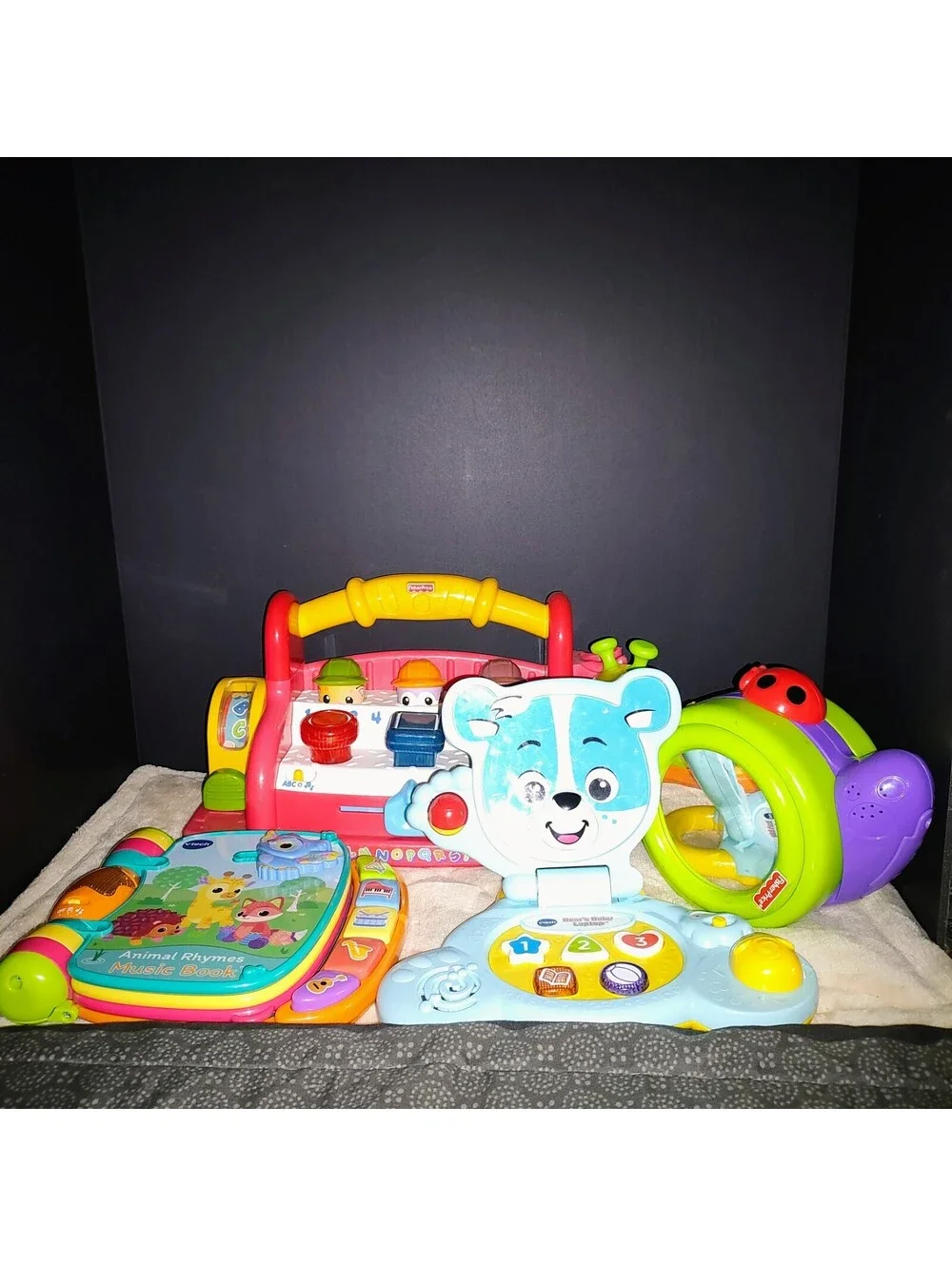 Large lot of 4 interactive baby and toddler learning toys VTech and Fisher-Price